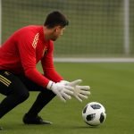 Trainingsbeeld van de Rode Duivels met focus op een doelman en bal, zonder herkenbare gezichten