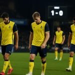 Spelers van Union SG verlaten het veld na de late nederlaag op STVV